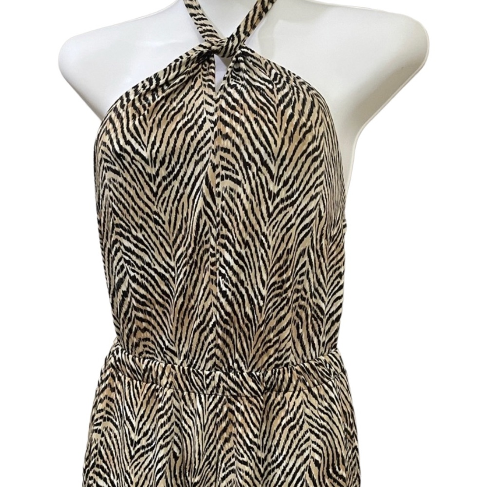 Super cute halter jumper in animal print.
